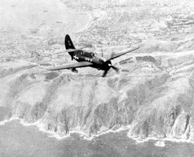 Curtiss SB2C-5 Helldiver of VB-18 flight over Valparaiso, Chile, in late 1946