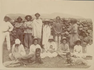 Group in Costume (?) in Front of Stone Wall or Ahu (Platform) December 1886 — Isla de Pascua — 1886 | Chile de Ayer