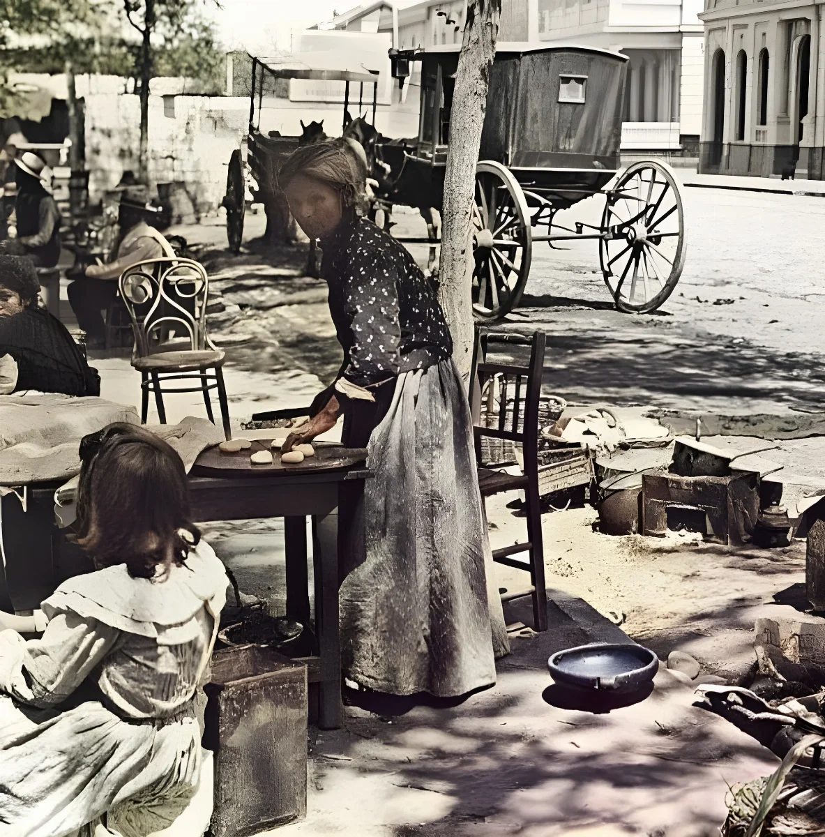Mujer haciendo pequénes en la alameda de las delicias — aprox. 1905 | Chile de Ayer